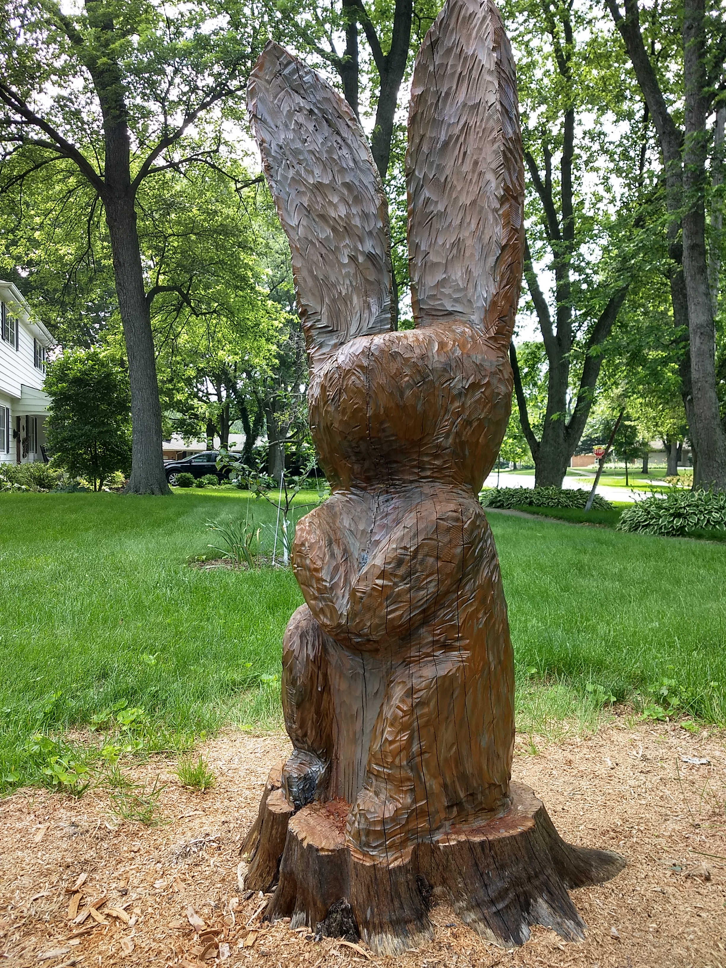 wooden rabbit carved from tree